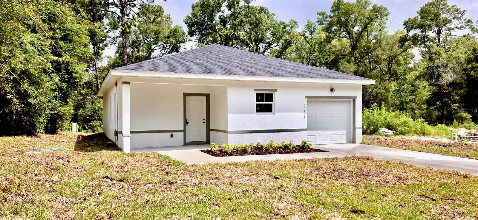 THIS BEAUTIFULLY DESIGNED NEW CONSTRUCTION HOME COMES WITH 3 BR / 2 BA ON A ONE STORY SPACIOUS OPEN FLOOR PLAN. BEAUTIFUL ENTRANCE OPENS HOME TO AN INVITING LARGE FAMILY ROOM WITH SPACIOUS CEILINGS THAT LEADS TO A LARGE OPEN KITCHEN AND BREAKFAST/DINING ROOM. ADJACENT TO THE FAMILY ROOM IS A SPACIOUS KITCHEN GREAT FOR ENTERTAINING FOR ANY HOMEOWNER. LARGE SERVING AREA WITH A BREAKFAST BAR AND SMOOTH COUNTER-TOPS WITH OAK SOLID WOOD CABINETS, AND INCLUDES STAINLESS STEEL KITCHEN APPLIANCE PACKAGE. EXQUISITELY STYLED CERAMIC TILE RUNS THROUGHOUT THE ENTIRE HOME. ALL BATHROOM COUNTER-TOPS COME WITH SOLID COUNTER TOPS. LOCATED NEAR INTER-STATE, SHOPPING CENTERS, AND RESTAURANTS. SELLER WILL ASSIST BUYER WITH CLOSING COSTS NOT TO EXCEED $5,000.00. STAINLESS STEEL REFRIGERATOR, RANGE, MICROWAVE, & DISHWASHER WILL BE INSTALLED PRIOR TO CLOSING.