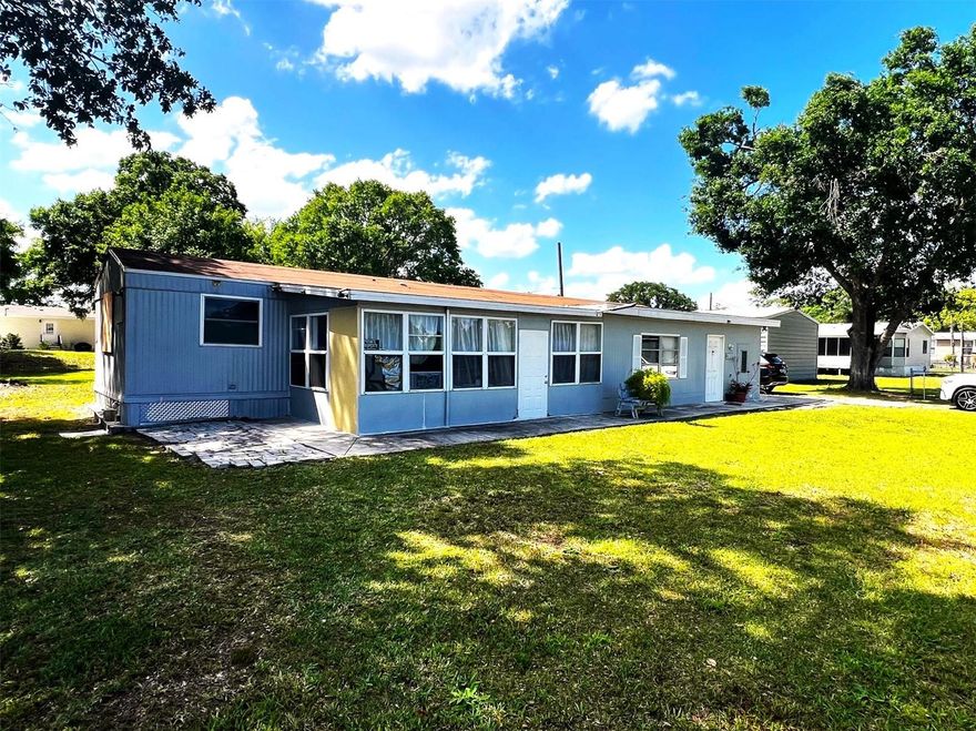 BACK ON THE MARKET. BUYER FINANCING FELL. Welcome to a fantastic opportunity to own a beautifully maintained 2-bedroom, 2-bathroom manufactured home featuring a versatile bonus room and a convenient garage shed — all nestled on an expansive 0.38-acre lot in the peaceful and picturesque community of Intercession City, Florida.
This delightful home offers 1,060 square feet of comfortable living space with a smart layout designed for functionality and relaxation. The open floor plan creates a welcoming atmosphere, while large windows throughout allow natural light to pour in and showcase stunning views of the surrounding conservation area. Whether you're sipping your morning coffee on the porch or enjoying an evening with loved ones, the tranquil setting provides the perfect backdrop for daily life.
The home includes:
• Two generously sized bedrooms, perfect for family or guests
• Two full bathrooms, offering both comfort and convenience
• A bonus room that can be used as an office, guest space, hobby room, or additional living area
• A garage shed for additional storage, workshop space, or outdoor gear
The back yard adds a layer of privacy and security, making it ideal for children, pets, or entertaining guests. There’s also plenty of room for outdoor activities, gardening, or even future expansion projects. The large lot offers limitless potential!
Located on the outskirts of Intercession City, this home combines the best of both worlds — peaceful, semi-rural living with easy access to nearby amenities. You'll be just a short drive from local schools, shopping centers, dining options, and popular Disney and Orlando attractions. Whether you’re looking for a primary residence, a seasonal retreat, or an investment property, this home checks all the boxes.
Don’t miss out on this rare opportunity to embrace the Florida lifestyle in a serene and spacious setting. Contact us today to schedule your private showing — your new home awaits!