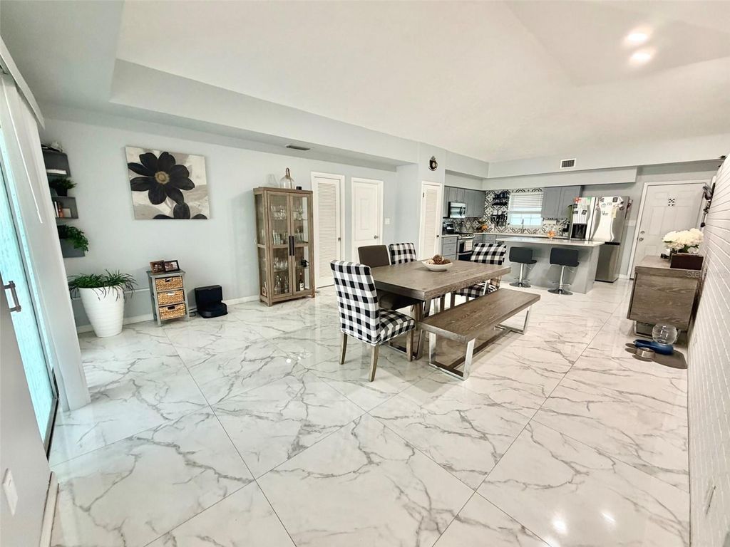 Photo of 6004 Memorial Highway, Tampa, FL 33615 (MLS # TB8520594)