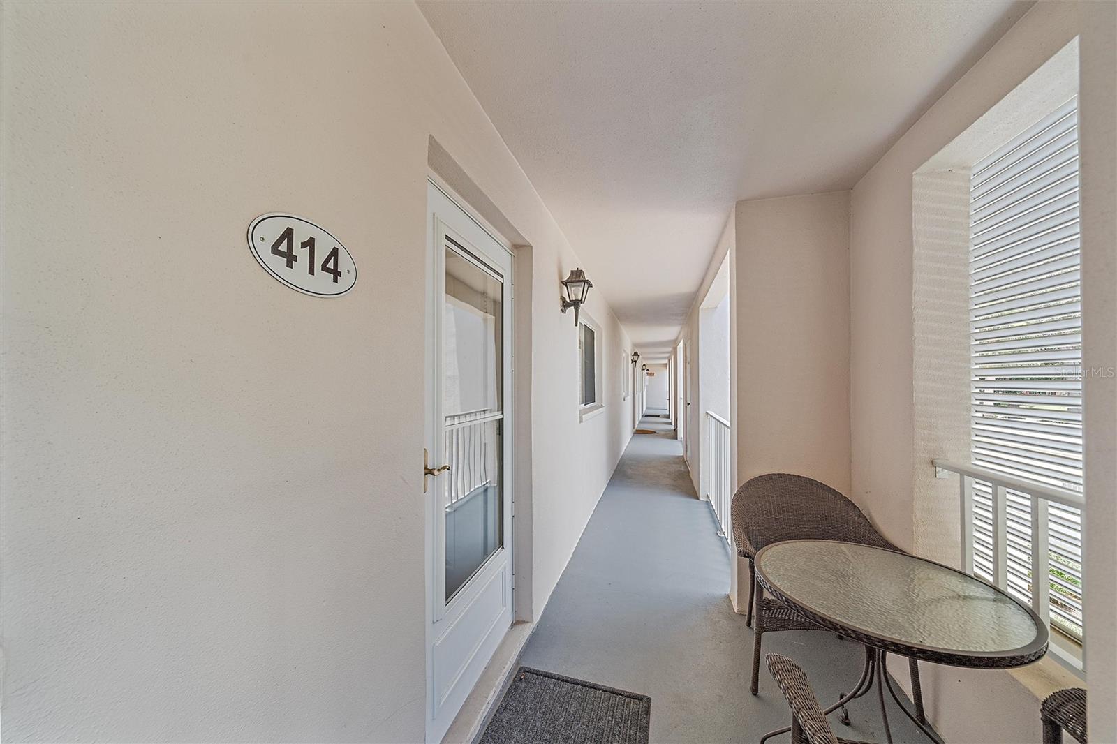 GREAT VALUE in Farmington Vistas at Plantation Golf & Country Club! Enjoy sweeping views of mature trees, the golf course, and a distant pond from your enclosed, all-weather balcony. This 2 bed / 2 bath TURNKEY FURNISHED condo features a spacious owner’s suite with HUGE walk-in closet and en-suite bath, plus a guest room with Murphy bed and wraparound desk—ideal for guests or remote work. Updates include: NEW AC (2023), fresh interior paint, new luxury vinyl flooring on the balcony, beautiful quartz counter, new range and dishwasher. There is a washer & dryer in the condo. Along with the assigned covered parking you have a large private storage room . YES, there is an ELEVATOR or stairs to 2nd-floor unit. The community pool is just steps away. Optional membership packages to the Plantation Golf and Country Club offers golf, tennis, pickleball, restaurant, and resort-style pool. But, the miles of walking and biking trails for all to enjoy that wind through the beautifully maintained Plantation community. Investor-friendly with 30-day minimum rentals allowed. Fantastic Venice location! Perfectly situated—just minutes from all that Wellen Park offers, including CoolToday Park, open-air concerts, dining, and events—yet peacefully removed from the construction noise and mess. And with Gulf beaches and historic Venice Island less than 10 miles away, you’re close to everything you love about coastal Florida, without the hassle. Good condition, full of value, and ready for you to enjoy ( or to enjoy rental income) This is the easy Florida lifestyle you’ve been looking for.