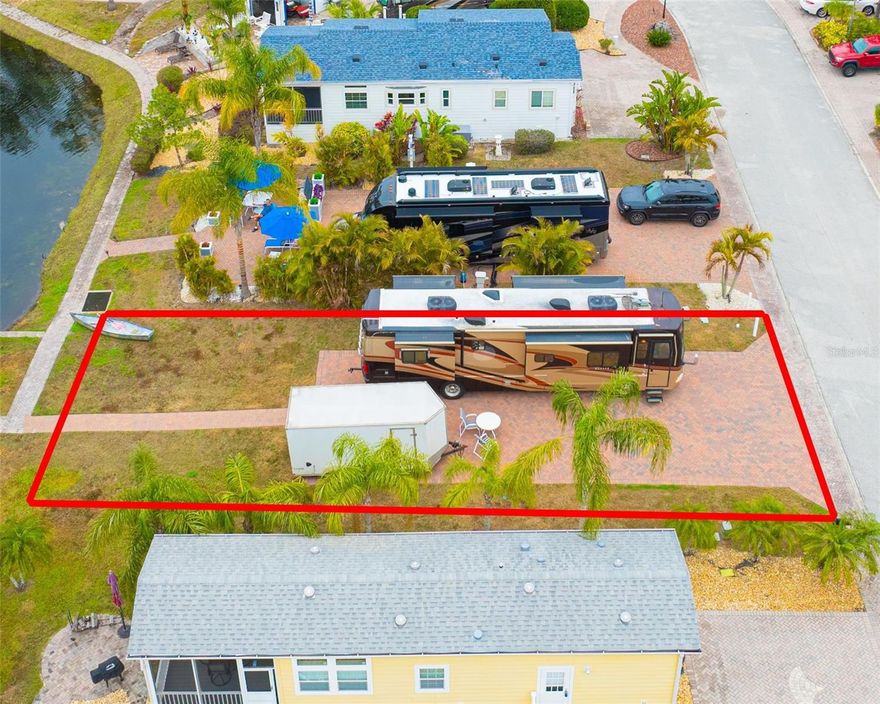 Prime Location RV Lot in Exclusive Clothing-Optional Community – Developer Closeout!
Don’t miss out on this last opportunity to own a premium RV lot in one of Florida’s most desirable clothing-optional, gated RV communities! Located at 6940 Amanda Vista Circle in Land O’ Lakes, this 90’x40’ lot offers the perfect blend of privacy, luxury, and convenience, making it an ideal retreat for RV enthusiasts and those seeking a vibrant social atmosphere.
This lot is just steps away from the clubhouse and pools, placing you in the heart of all the community activities. With brick pavers throughout, you’ll have easy access and a beautiful space for enjoying outdoor living. Surrounded by mature tropical landscaping with palm trees, it provides a serene and welcoming atmosphere, offering the perfect place to relax after a day of socializing or exploring the area.  This lot has a 100 amp full hookup and Verizon fiber optic is available at the street.
As a resident of this exclusive community, you’ll enjoy resort-style amenities including two pools, a hot tub, a tiki bar, and a dog park, all designed to enhance your lifestyle. Whether you’re looking to unwind by the pool, meet new friends at the tiki bar, or enjoy some quiet time in your beautifully landscaped lot, you’ll find everything you need just steps from your door.
The location couldn’t be better: situated next door to Caliente Resort and close to other clothing-optional resorts, this lot offers access to a vibrant, like-minded community. Caliente is just a golf cart drive away and offers a variety of membership options.  Plus, with golf courses, shopping, restaurants, and the airport nearby, you’re perfectly positioned for convenience and leisure.
With the developer’s closeout now underway, this is your final chance to secure one of the last remaining premium lots in this exceptional community.