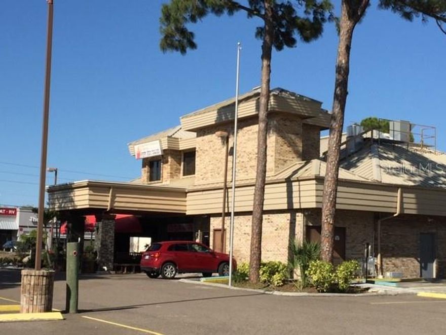 Professional Office Suites within 1 mile of the Gulf of Mexico ! Great location for an office suite. Entrance into the elevator corridor go up stairs and the elevator opens up to the main waiting room area. There is a secured entrance door into the back office area upon entry the conference room is to the right. Units come with a kitchen break area, 2 public restrooms. Tenants are responsible for their own phone systems and internet. lease is flat rate for 560.00 a month in addition Florida sales tax to be paid at rate of 5.5%, no other costs involved. There is plenty of parking and a new Pub N Grub in process / restaurant on site. * Agents renting space for themselves are not entitled to commission* A security deposit of $560 a month is required upon move in.  *Location is within 1 mile of gulf Beaches and on main road get beach traffic and inland traffic*