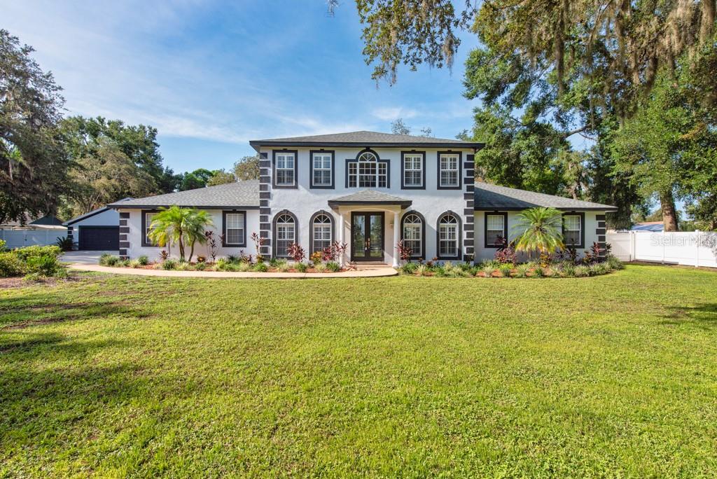 Acreage, Privacy & Endless Possibilities—This Move-In Ready Pool Home Has It All!
Tucked away on a peaceful cul-de-sac in the quiet, low-HOA community of Shackleford Estates, this expansive property offers the perfect blend of comfort, space, and entertainment on a 1.04-acre lot with both a luxurious main residence and a versatile detached garage.
Step inside the 4-bedroom, 3.5-bathroom home boasting 3,409 square feet of living space. The inviting foyer sets the tone with elegant tile flooring, French doors, and a striking custom glass panel staircase railing leading to the second floor. The main living areas include a family room accented by classic pillars, a formal dining room with a tray ceiling, and a spacious living room with French doors opening to the pool area.
The kitchen is as functional as it is stylish, featuring wood cabinetry, granite countertops, recessed lighting, a center island with bar seating, and black appliances. Adjacent is a cozy eat-in dining nook, perfect for casual meals.
Entertainment is elevated in your very own theater room, complete with 12 power reclining seats, light-up cup holders, a projector screen, projector, built-in wine cooler, concession stand, and a popcorn machine—all of which will convey with the home, creating the ultimate movie night experience or entertaining space.
The primary suite offers a quiet retreat with a tray ceiling, ceiling fan, walk-in closet, and a ductless split AC unit for personalized comfort. The en-suite bathroom feels like a spa with dual vanities, a garden tub, and a luxurious tile shower with three showerheads.
The additional three bedrooms feature carpet, ceiling fans, and ample closet space, with a well-appointed guest bathroom featuring a granite-top vanity and tub/shower combo. A half bath is conveniently located off the kitchen.
Outside, the screened-in pool and patio area is the ultimate escape—featuring a chlorine pool with beach entry, waterfall grotto, paver decking, mounted TVs, fans, and a built-in wet bar and grill area—perfect for entertaining.
Beyond the pool, the huge fenced backyard offers privacy and room to roam, with a storage shed tucked away for additional convenience. Also included are 9 egg-producing chickens that will convey with the property if the buyer chooses, adding a touch of country charm and sustainability.
For the hobbyist or car enthusiast, the 1,800 sq ft detached garage is a dream come true. It easily fits 4 cars, includes a climate-controlled flex room (ideal as an office, bedroom, or man cave), and even has its own full bathroom—making it a functional space for work or play.
Additional highlights include a 3-car attached garage with an oversized water heater, a water softener system, and private road access.
This home delivers a rare opportunity for resort-style living, multi-functional space, and acreage—all just minutes from daily conveniences. Don’t miss your chance to own this one-of-a-kind property!