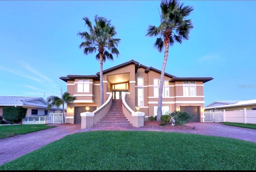Welcome to your waterfront oasis! This luxurious 3-bedroom, 2/2 -bath home boasts unparalleled views of the Intracoastal Waterway, offering a serene escape from the everyday hustle and bustle. Designed to maximize the beauty of its surroundings, the open floor plan and expansive windows fill the home with natural light and stunning vistas.
Step inside to a high-end kitchen featuring double ovens, a gas range, and elegant granite countertops. The primary suite is a peaceful retreat with breathtaking water views, a spacious walk-in closet, and a spa-like en-suite bath with double vanities.
Enjoy your morning coffee or evening sunsets on the expansive 50-foot balcony, where every sunrise is a masterpiece.
Downstairs, the home features a second indoor/outdoor industrial kitchen with a bar that opens to the saltwater pool and spa — Whether you're entertaining or unwinding, this space is designed for seamless indoor-outdoor living. Additional highlights include a home gym and ample storage for all your motorized toys.
Located just minutes from beaches, parks, nature preserves, boat ramps, and restaurants, this residence blends tranquility with convenience. Currently operating as a successful short-term rental with five-star reviews.
Don’t miss your chance to experience the coastal lifestyle you’ve always dreamed of. Schedule your private viewing today!