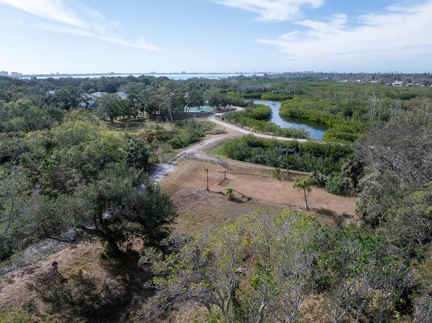 Amazing location! This buildable residential lot is located just a few hundred feet from the Clambayou Nature Preserve, offering access to bike and hiking trails, water trails, fishing docks, lookout points, and paddleboard/kayak launches.

Tucked away on a quiet dead-end street, the property enjoys a peaceful, secluded setting with a wooded park in front of the lot and the bayou just to the west. Enjoy epic sunsets and daily nature views from your future front porch. A second-story balcony or rooftop terrace may offer water views and expansive Florida nature scenery (buyer to verify).

Ideally situated near the Skyway Marina District, just one block from the new Skytown Development, this location blends tranquility with convenience. Enjoy a 1-mile bike ride to Tiki Docks for live music and waterfront dining, or take a scenic 3-mile ride through the preserve to Downtown Gulfport.

Survey, soil report, and buildable lot letter available. Buyer to verify zoning, building requirements, and all development potential. A rare opportunity to build in one of the area’s most desirable nature-forward locations.

Motivated seller eager to work with buyers agent, developers and builders. Other lots available on block.