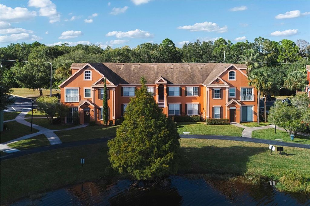 Photo of 9260 Lake Chase Island Way, Tampa, FL 33626 (MLS # TB8442084)