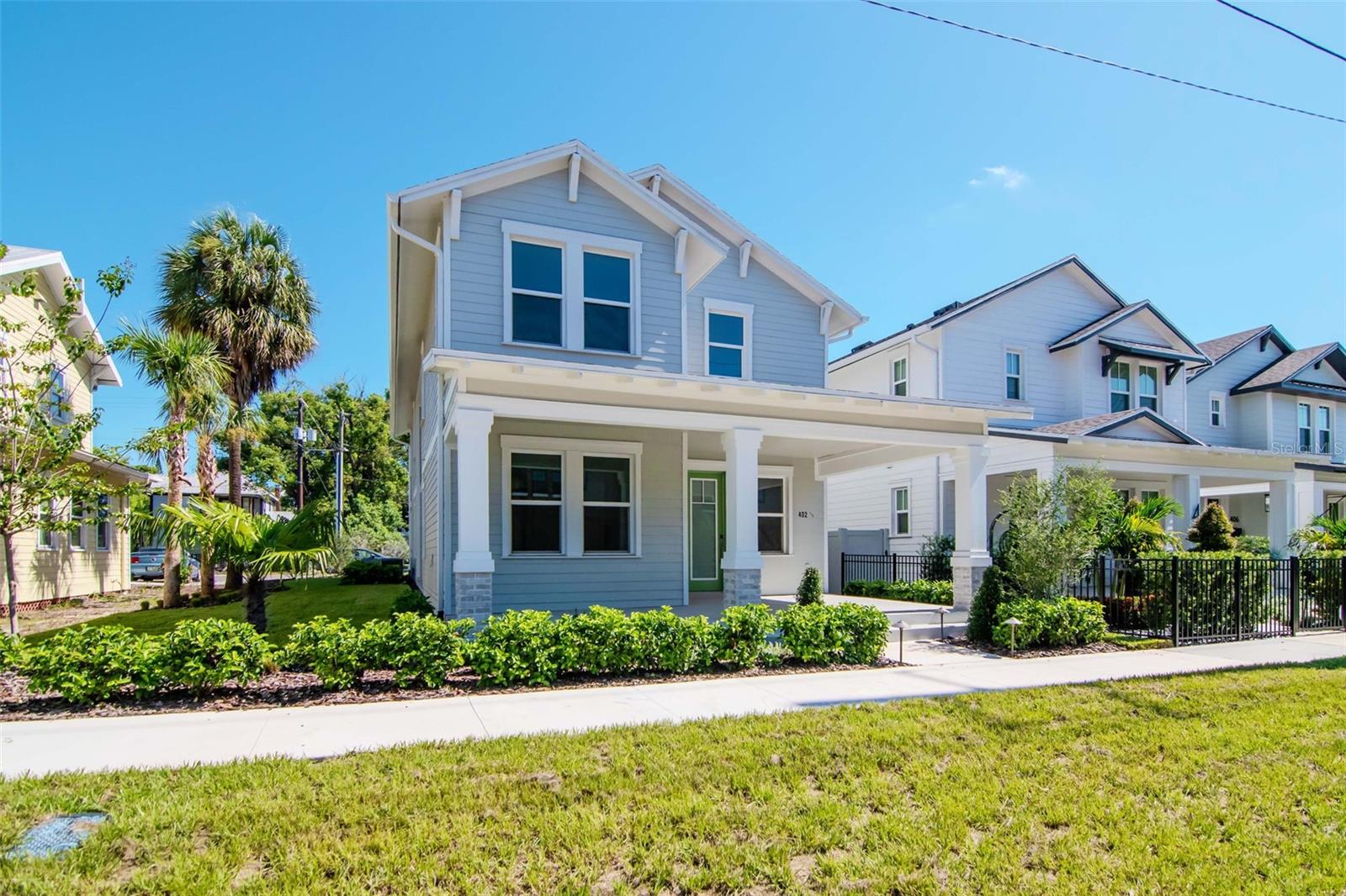 One or more photo(s) has been virtually staged. Home is ready for immediate occupancy. The Amethyst plan is a plan that combines defined spaces within open concept living, just a short walk
from Armature Works and the River Walk in Tampa Heights. This 2-story home that features 3 beds/2.5 baths and a detached 2-car garage. A Luxurious Chef's Kitchen displays cabinets to
ceiling that add grandeur and extra storage to the heart of the home. Gorgeous zellige 6x6 tile enhances the kitchen walls and a pot filler accentuates the high-end designer space. Marble-like
quartz countertops and waterfall edges are included on the kitchen island. A side patio accessible through French doors is ideal for entertaining and provides extra brightness to the space. The
primary bedroom suite is highlighted by a generous walk-in closet and spa-like primary bath with dual-sink vanity, large luxe shower, and private water closet.