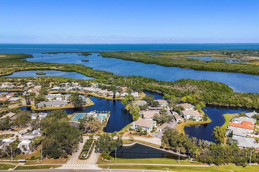 TURNKEY FURNISHED THREE BEDROOM, THREE FULL BATH HOME in popular PERICO ISLAND community. Live the Florida lifestyle you’ve been dreaming of! This end-unit townhome offers tranquil pond views from the living room and every bedroom. Your new home is located just 3 miles from the world-famous Anna Maria Island beaches.

You will enjoy resort-style amenities including tennis and pickleball court, a heated pool, clubhouse, fitness center and library in this friendly, active neighborhood surrounded by lush tropical landscaping and scenic ponds. This is a pet friendly and all ages are welcome.

If a first floor bedroom and full bath are important to you this could be your new home. The living room, dining areas and a bright kitchen complete the first floor. Upstairs, the spacious primary suite overlooks the pond and includes a generous size walk-in closet, dual sinks, soaking tub, and separate shower and toilet room. The third bedroom also has an en-suite bath with shower and a lovely view of the pond.

Additional highlights include indoor laundry conveniently located near the bedrooms, ample interior storage, and an outdoor storage closet for your beach gear. The carport is just steps from your front door for easy access.

Explore nearby Perico and Robinson Preserves, or spend weekends kayaking, horseback riding along the bay, or jet skiing from the causeway. Now’s the time to start living the Florida lifestyle you deserve. QUICK CLOSE AND MOVE IN READY.