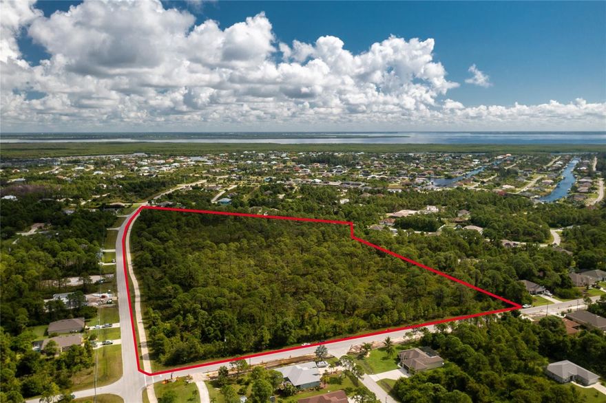 Prime 21± acre Commercial General (CG) site with frontage on both Calumet Blvd and San Domingo Blvd in fast growing South Gulf Cove. This high-visibility tract offers endless possibilities for retail, office, medical, hospitality, and a wide range of commercial uses allowed under CG zoning. Located in a rapidly growing residential market with strong demand for everyday services and new commercial development. Dual frontage provides excellent access, signage, and design flexibility—ideal for multi-phase or mixed-use planning. Ideal location just a short drive to beaches, boating, golf, and major regional corridors, supporting strong year-round traffic.  This is a rare opportunity to secure a large, flexible commercial tract in one of Charlotte County’s most active growth corridors.