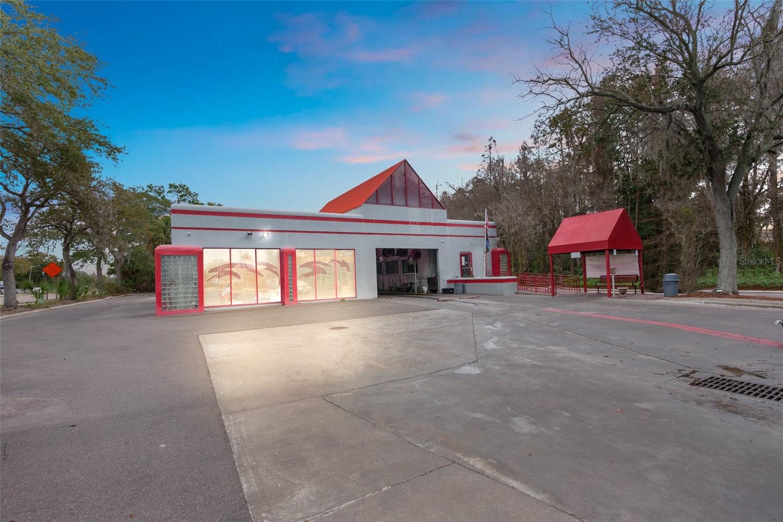 Mission Bell Car Wash is a full service car wash sitting on 2.05 acres of PRIME land location with approximately 326 ft of Road frontage facing Fletcher Ave on the corner of North Dale Mabry and Fletcher. A family owned and operated business since 1990. All the equipment has been meticulously maintained, New parking lot was installed in 2020 and New roof in 2013. This sale will include the Concrete block construction building, Land and fully operating business in place including machinery and equipment to run the business as well as the retail merchandise.
There is a Four bay detailing building, Vacuum station, Machine Room which houses all the machines, chemicals, etc., car wash station, and hand drying station. A Break room for employees separate from the main lobby area, Two large private offices inside the customer area along with a large retail section where Clients can wait while watching their car go through the machine. There are several vending machines generating an additional revenue for the business. Long term staff in place. High traffic pattern of over 37,000 cars per day pass by this business. Tampa is the third largest city in Florida and rapidly growing. Trade Area report, demographics and financials are available upon request. Located next to Lowes, Twistee Treat, Wells Fargo, Fifth Third Bank, PNC Bank, Fresh Market, and Palms of Carrollwood Shopping Center.