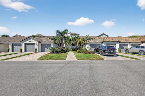 Photo of 5720 Palmer Circle #102, Bradenton, FL 34211 (MLS # A4672655)