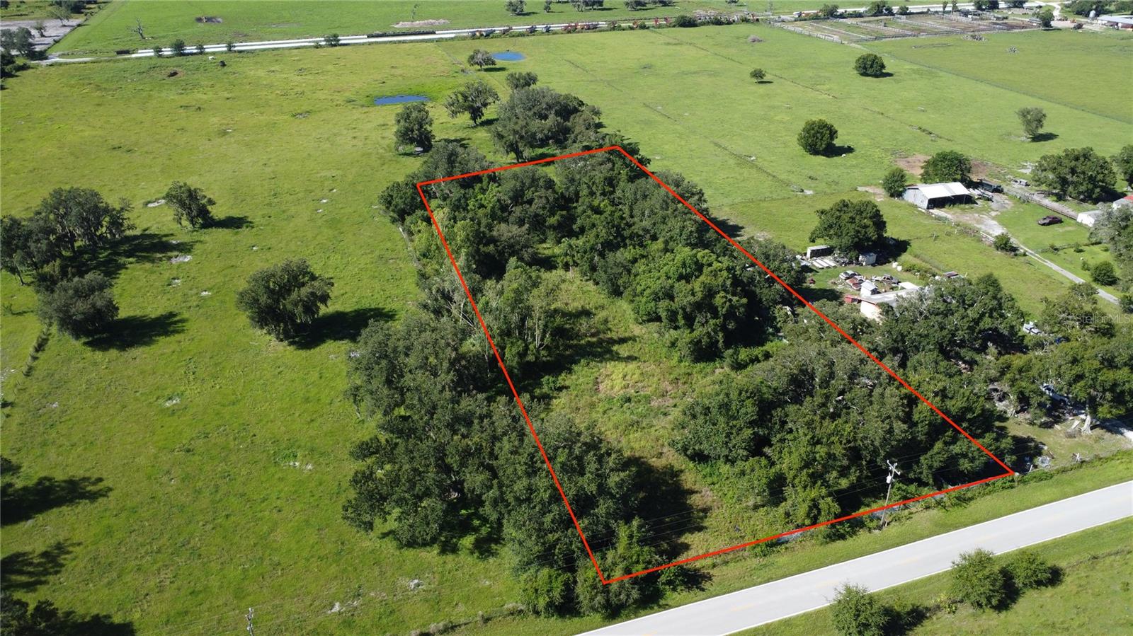 This beautiful 2 acre parcel in south Desoto County is zoned for agricultural use and could potentially make a beautiful homesite, hobby farm, or just simply provide you room to breathe! Boasting mature oaks, this property provides shade and good old Florida charm. Located off of a paved road with a gated entrance and out of a flood zone, this slice of paradise is ready for your next adventure.
