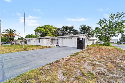 Photo of 7923 Ironbark Drive, Port Richey, FL 34668 (MLS # TB8521862)