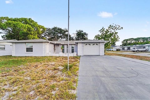 Photo of 7923 Ironbark Drive, Port Richey, FL 34668 (MLS # TB8521862)
