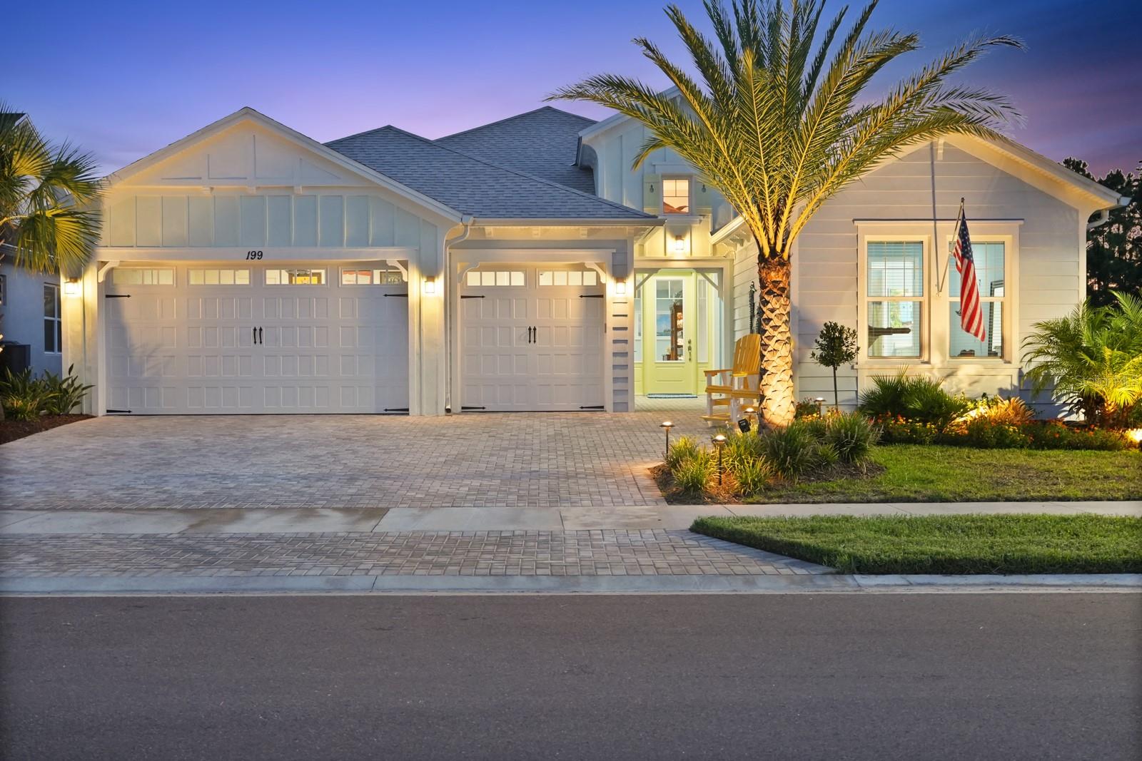 Welcome to 199 Catamaran Cove, where this stunning Aruba model is perfectly positioned at the end of a cul-de-sac, backing up to a protected nature preserve—so you’ll never have rear neighbors. Thoughtfully upgraded inside and out, this home blends tropical living with luxury finishes throughout.
Inside, enjoy 9-foot doors, tile flooring (carpet only in the guest room), insulated block walls, crown molding, and built-in speakers in nearly every room—including the lanai and pool area. The open layout is bright and functional, with recessed lighting throughout.
The chef’s kitchen features a massive quartz island, Level 5 cabinets with crown molding and pull-out shelving, under-cabinet lighting, KitchenAid appliances, and a smartly placed outlet above the cabinets for holiday lighting. A double trash pull-out, vented hood, and upgraded Moen faucets complete the space.
The living room includes a coffered ceiling, custom accent wall, surround sound, and even a Catamaran mural for fun. The dining area boasts a 10-ft custom bar with dual beverage coolers, lighted cabinets, shelving, and a second 9-ft slider that opens up the home beautifully to the backyard.
The primary suite is a showstopper with shiplap ceilings, accent wall, crown molding, recessed lighting, and pocket doors. The bathroom is outfitted with frameless glass, rain head shower, quartz counters, Level 5 cabinetry, and upgraded fixtures. The guest suite and laundry room are also fully upgraded with quartz counters, cabinet storage, and deep sinks.
The 3-car garage has epoxy flooring, a utility sink, smart openers with cameras, and a filtration system hookup.
Out back, the 32x16 saltwater pool includes a heater/chiller, 5 LED-lit waterfalls, bubbler, sun shelf, and glass pebble finish. The entire area sits on a concrete base with travertine & limestone pavers and features a 5-ft stone privacy wall. The outdoor kitchen includes a granite counter, gas grill, Kamado Joe smoker, lighting, outlets, and storage. The lanai has a cedar ceiling, wood propeller fan, natural gas fire pit, and TV-ready accent wall—all under a screened enclosure.
Rounding it out are flood lights, security cameras, up-lighting, and gorgeous Sylvester palms for added curb appeal.
?? Live every day like it’s a vacation with world-class amenities just a golf cart ride away—resort-style pools, live music, pickleball, fitness centers, restaurants, and more.