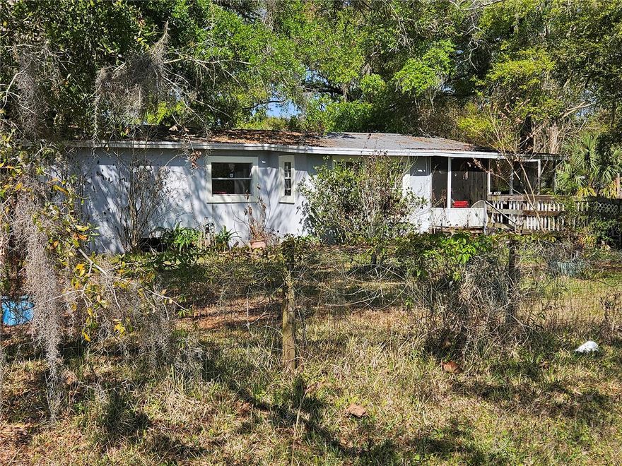 INVESTOR SPECIAL! This property is a cash buy only property and is being sold As-Is. Buyer will be responsible for clearing the lot. Once cleared the lot would be great for a new home.