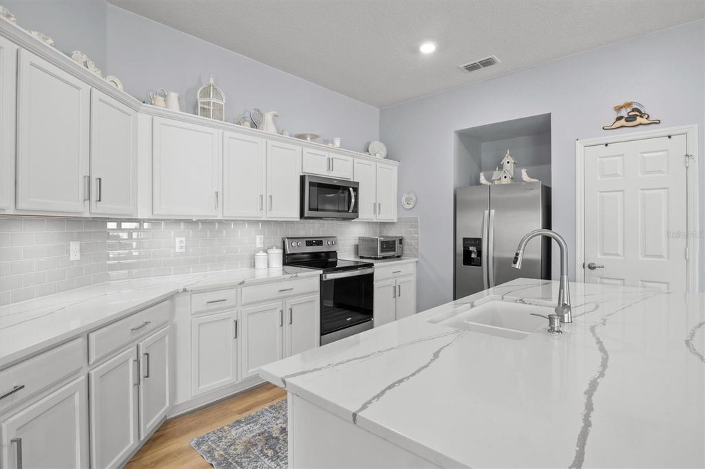 Photo of 1591 Mattie Pointe Place, Auburndale, FL 33823 (MLS # L4957592)