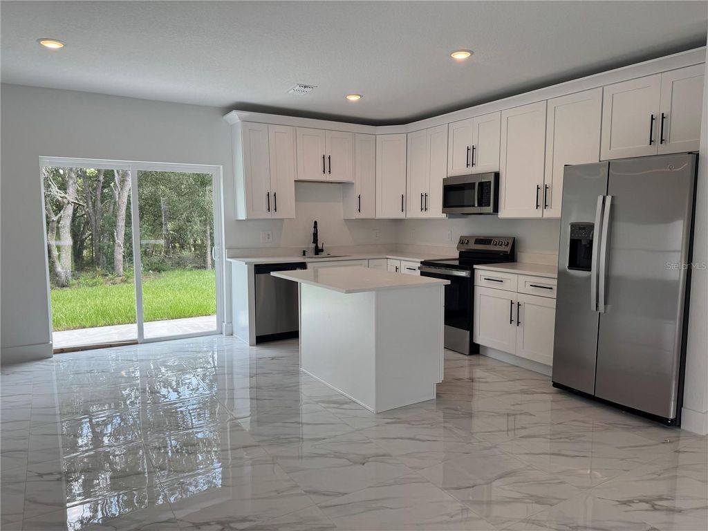 Photo of 2007 W Hamshire Blvd, Citrus Springs, FL 34434 (MLS # O6333687)