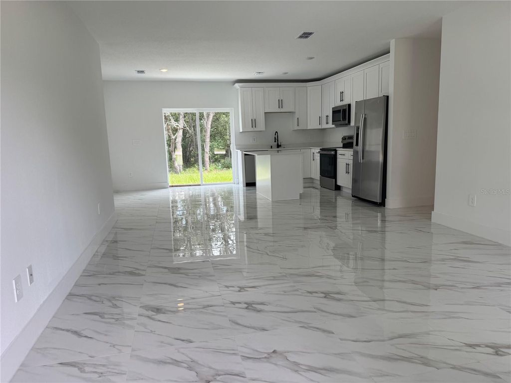 Photo of 2007 W Hamshire Blvd, Citrus Springs, FL 34434 (MLS # O6333687)