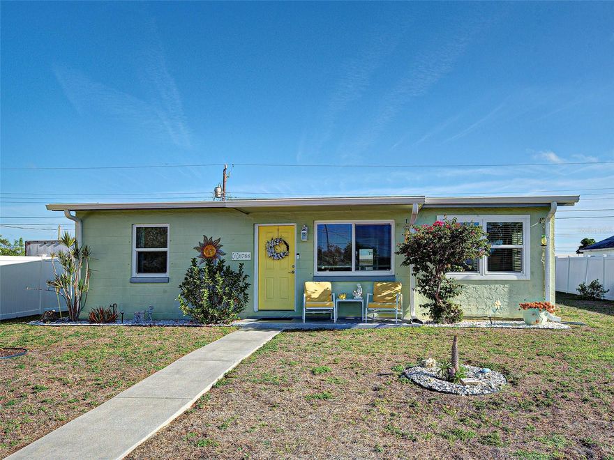 MOVE IN READY!  Nicely maintained home, bright interior features 2 bedrooms, one bath, separate dining room and a laundry room.  Ideal for first-time buyers or a seasonal retreat from northern winters. NEW WINDOWS, AC AND ELECTRICAL PANEL installed in 2020.  Enjoy nearby shopping, dining and entertainment. Don’t miss this home—schedule your showing today!