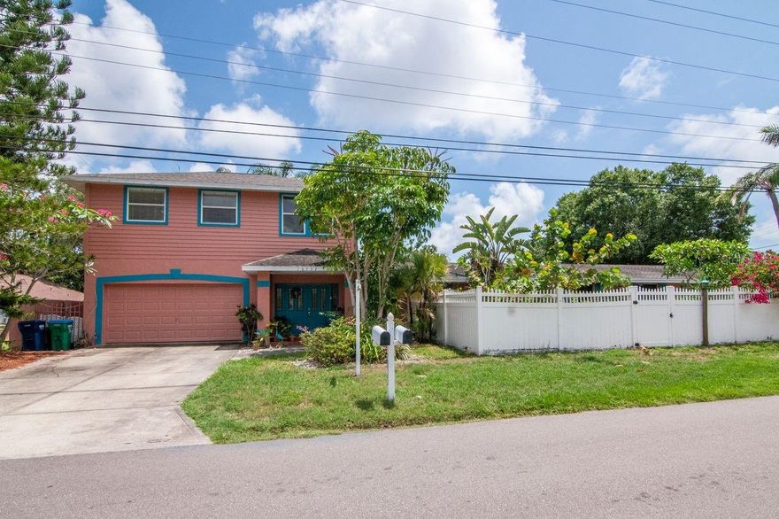 Exceptional multi-family opportunity in the heart of Seminole! This unique property features a spacious 3-bedroom, 4-bathroom main home along with a bright and private 1-bedroom, 1-bath in-law suite — perfect for extended family, rental income, or a vacation rental opportunity. The main residence offers plenty of room to spread out with two separate living areas, a formal dining room, dedicated laundry room, and a 2-car garage. TECO gas is connected to the water heater, dryer, and stove for added efficiency and convenience. The well-lit in-law suite provides privacy and flexibility, making it ideal for guests, tenants, or additional income potential. Also includes its own private laundry room with washer and dryer included. Home also has potential to become a triplex. Situated on a beautifully landscaped corner lot in a quiet, family-friendly neighborhood, this property is already zoned multi-family and surrounded by lush tropical landscaping within its own fenced yard. Enjoy an unbeatable location just minutes from the sandy Gulf beaches, Seminole City Center shopping and dining, schools, community parks, and the Pinellas Trail. Whether you’re searching for a primary residence with income potential or a versatile investment property, this Seminole gem offers endless possibilities!