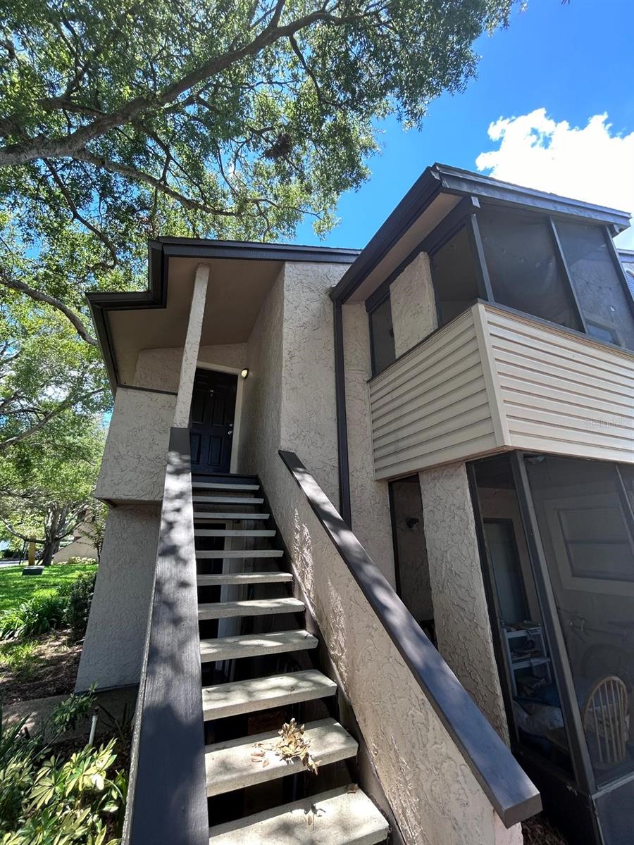 Welcome to this bright and cozy 1-bedroom, 1-bathroom corner unit located in the highly desirable Winter Park area of Orlando. This well-maintained condo features ceramic tile flooring throughout, a spacious walk-in closet in the master bedroom, a laundry closet with washer and dryer included, and modern light fixtures. Enjoy the outdoors on your very nice private balcony, and take advantage of private stairs from the outside entrance—a rare and convenient feature. Located in a beautifully kept community with easy access to shops, restaurants, and all of Winter Park's charm. Ideal as a first home, seasonal getaway, or investment opportunity!
