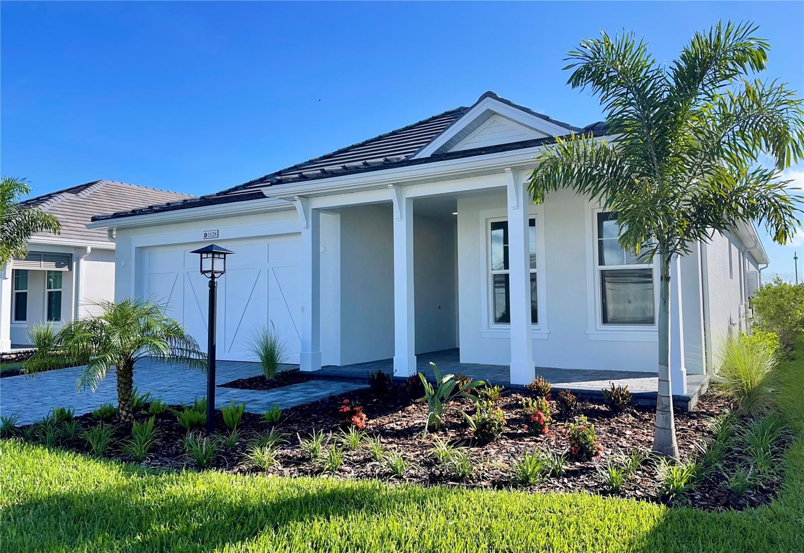 Sleek. Trendy. Brand New.
Be the first to enjoy luxury living in this BRAND-NEW Halyard model by Homes by Towne, ideally situated in the sought-after waterfront community of Lakehouse Cove at Waterside, Sarasota. Thoughtfully designed, this brand-new 3-bedroom, 3-bath residence with a den showcases refined style and lasting comfort. The open-concept layout features upgraded modern tile flooring throughout, soaring ceilings, and hurricane-impact windows that fill the space with natural light and peaceful water views. The kitchen boasts high-end appliances, quartz countertops, and a large island ideal for entertaining or casual meals. A versatile den offers a quiet retreat for a home office, media room, or additional guest space. Step outside to your lanai, perfectly positioned to capture peaceful pond views and Florida breezes. It’s an ideal setting for morning coffee or evening gatherings, surrounded by the calm and serenity of nature. Lakehouse Cove residents enjoy an unmatched lifestyle with access to a state-of-the-art fitness center, resort-style pool, clubhouse, kayak launch, pickleball courts, and scenic walking trails. Just minutes from Waterside Place, you’ll be close to weekly farmers markets, waterfront dining, boutique shops, and community events like Ranch Night. Downtown Sarasota, UTC Mall, and the award-winning Gulf beaches are just a short drive away. This is not just a new home—it’s a fresh start in one of Lakewood Ranch’s most dynamic and sought-after neighborhoods. Schedule your private showing today and be the first to call this exceptional residence yours.