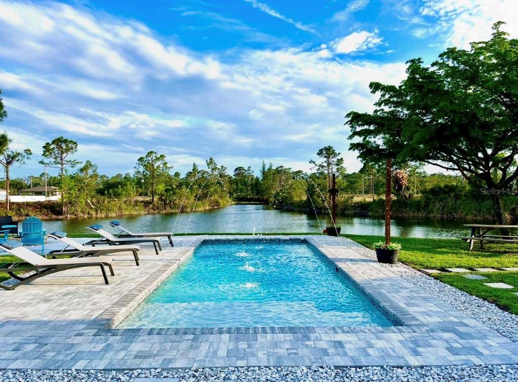 Photo of 2012 NE 33rd Lane, Cape Coral, FL 33909 (MLS # V4949558)