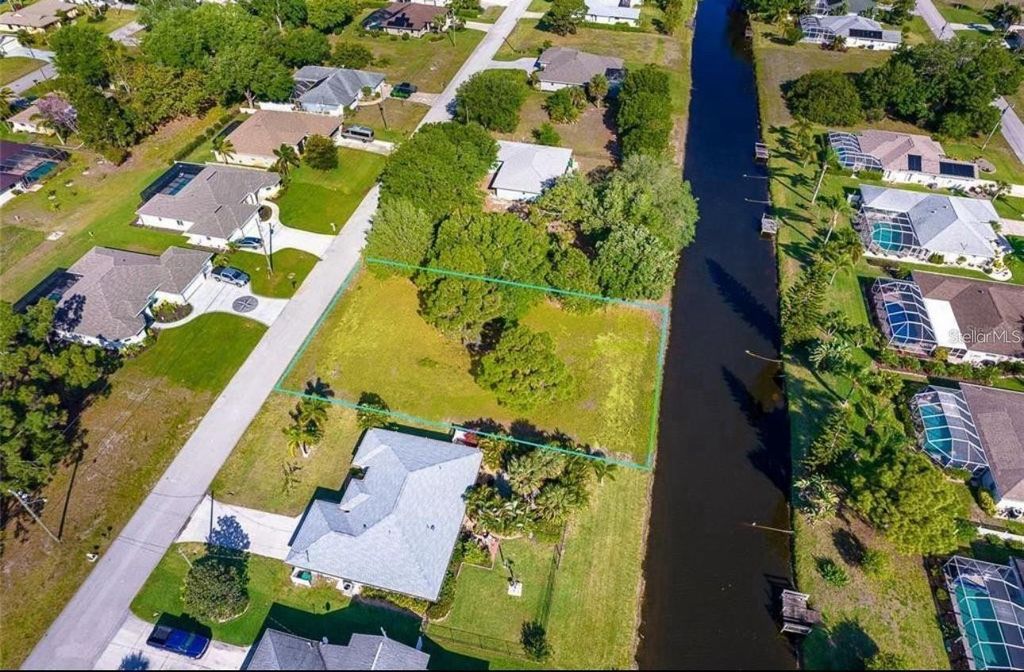 Photo of 74 Mariner Lane, Rotonda West, FL 33947 (MLS # A4676762)