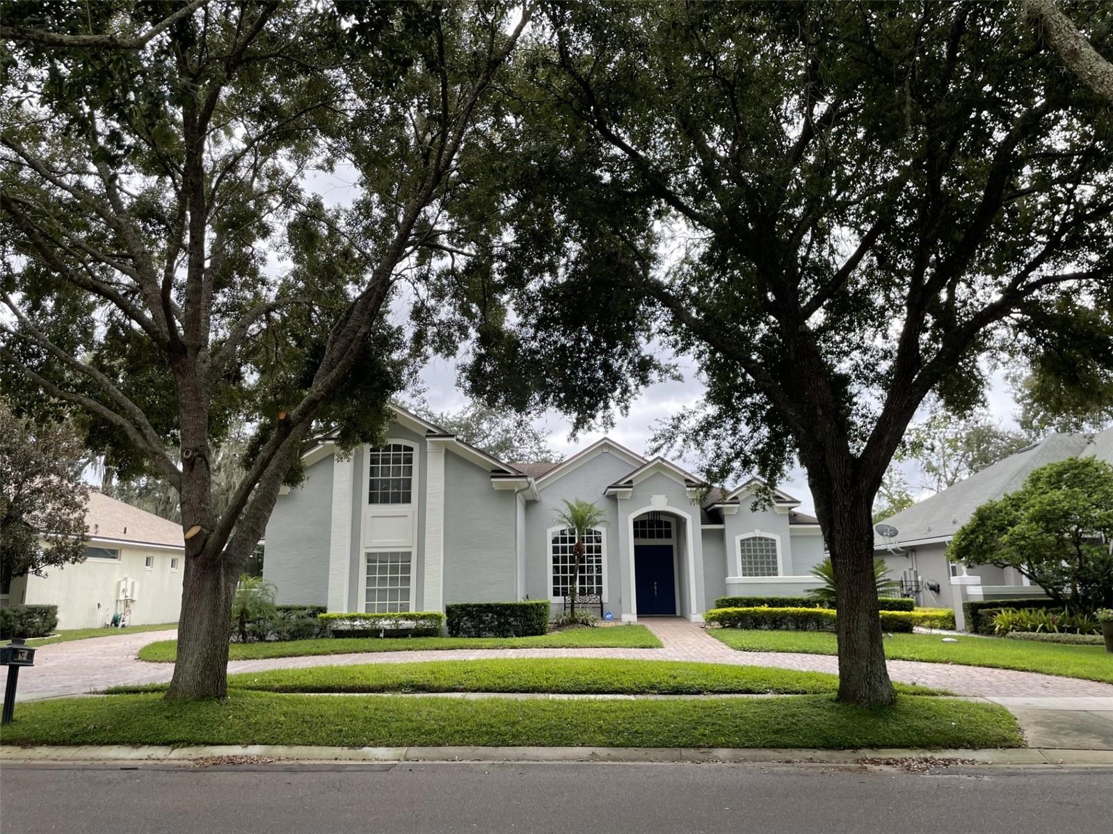 This stunning four bedrooms, four and a half baths located in the desirable Bay Hill area, Sand Lake Chain of restaurants, great schools. Recently remodeled, modern open concept Kitchen with high-end stainless still appliances, new cabinets, new flooring, recently repiped up to code. Brand new A/C system upstairs, brand new Summer Kitchen. The pool was resurfaced and paved all around. The SPA is heated. You have to check this one, house is perfect, neighborhood is perfect, location is perfect. Some pictures were taken with furniture just to give an idea of space.