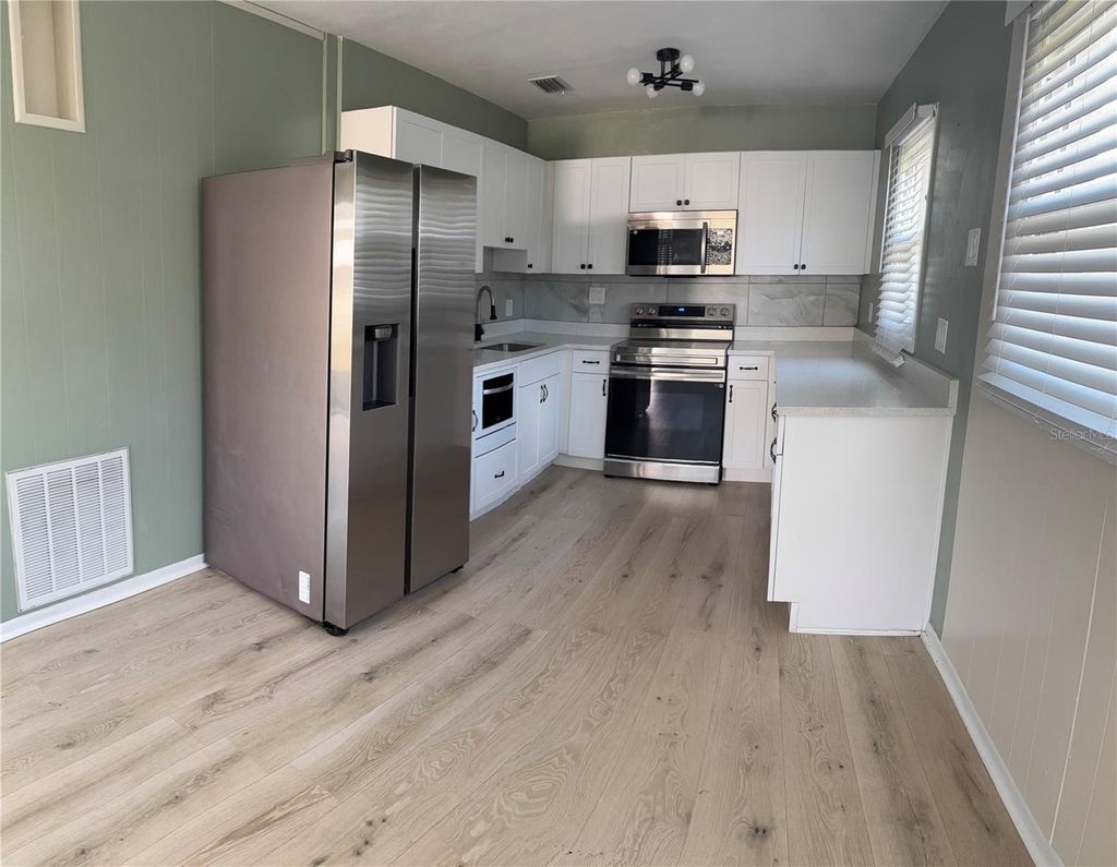 Photo of 7661 18th Way N #1, St Petersburg, FL 33702 (MLS # TB8458156)