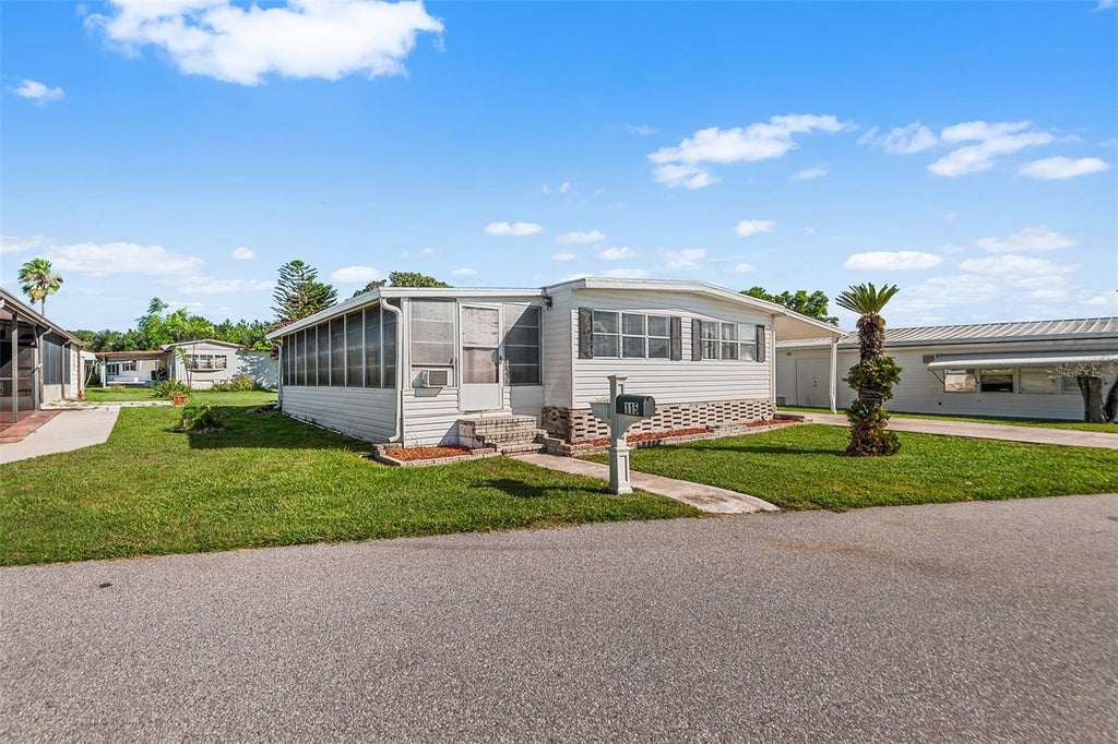 Photo of 115 Cherrywood Drive, Lake Wales, FL 33898 (MLS # L4965314)