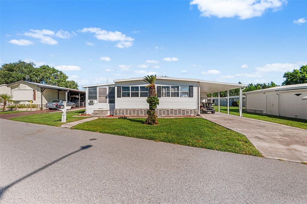 Photo of 115 Cherrywood Drive, Lake Wales, FL 33898 (MLS # L4965314)