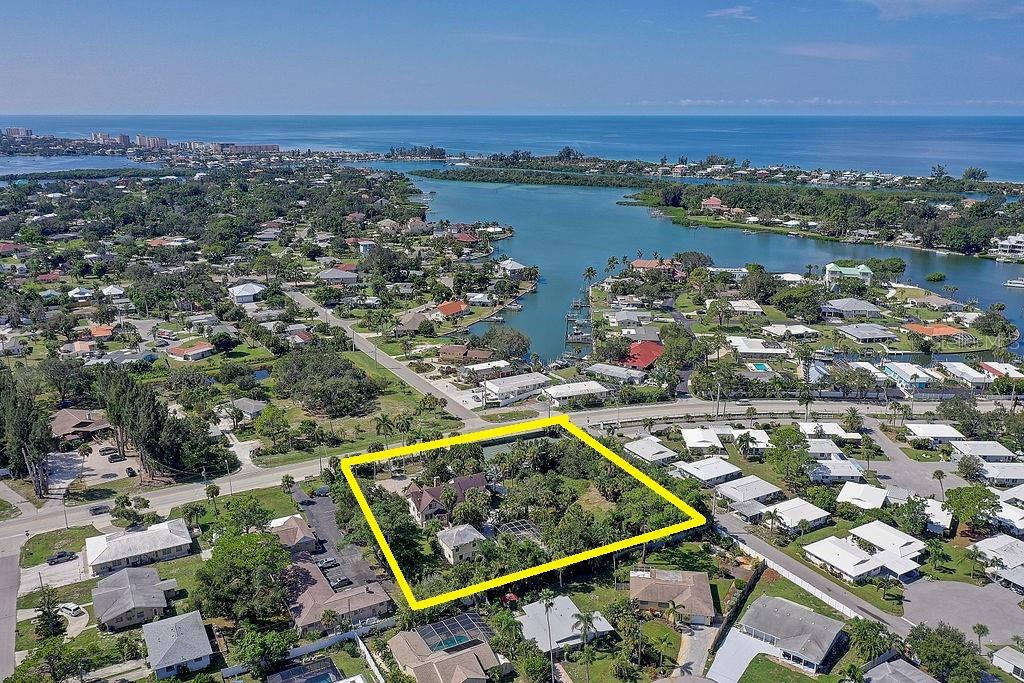 This property presents an exceptional investment opportunity nestled in the heart of Nokomis Beach, just west of Tamiami Trail and a mere six blocks from the pristine shores of the affluent Casey Key. Currently, it boasts immediate income generation through three distinctive and meticulously maintained apartments. What sets this property apart is its strategic positioning for upscale condominium development on its expansive 1.33-acre lot, holding the multi-family (RMF1) zoning. Notably, the Sarasota County building department has already granted preliminary approval for the construction of up to 16 condominiums on this site, underscoring its substantial development potential.
Nokomis Beach is a rapidly evolving area, marked by significant growth within Sarasota County. The region's appeal is further emphasized by nearby developments, including preliminary approvals for both retail and condominium projects situated across the street, along with additional expansive residential initiatives to the west. The presence of the three existing income-generating seasonal rental apartments offers a unique opportunity to offset operational costs while concurrently pursuing further development plans, permitting, and infrastructure improvements. Additionally, the property is conveniently connected to County water, with County sewer readily available at the curb.
The property's location is truly exceptional, positioned within a short six-block distance to Nokomis Beach, in close proximity to Tiki Bars, restaurants, and shopping establishments. It also provides convenient access to a range of attractions, including North Jetty Park, Venice Jetty, Legacy Trail, The Island of Venice, medical facilities, UTC Mall, downtown Sarasota, St. Armand's Circle, and all major area airports. Furthermore, private air travel options are readily accessible on The Island of Venice.
Additionally, the current owner is open to exploring a Joint Venture for the development of the Sarasota County-approved condominium plans. Further details are available upon request, contingent upon the execution of a Non-Disclosure Agreement. This property offers a prime investment opportunity for discerning investors and developers seeking a remarkable project in this flourishing area. Must have an appointment to view the property.