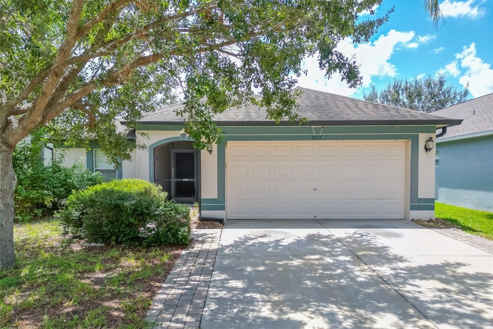 Breathtaking views will set this 4BR/2BA home apart from the rest! Enjoy Florida's natural wildlife, including deer, from the large screen room all while soaking in the sunshine beaming off the water, which is surrounded by woods...a true site to behold! Plus, the outdoor furniture, firepit, storage unit and grill are all included! The home features a wide open three-way split floor plan creating flexible living space with cathedral high volume ceilings and fans in every room. The expansive Great room has wood look laminate flooring, all the wet areas have neutral ceramic tile, and all the bedrooms have carpet. The spacious eat-in Kitchen is a chefs delight with solid wood cabinetry, granite counter tops, stainless appliances and pantry. The adjacent utility room also features an additional closet which could be a second pantry or appliance/gadget storage. The primary suite has ample room with en suite garden bath, separate shower and walk-in closet - everything you are looking for! Two spare bedrooms are placed upfront while the fourth is in the back of the home making a great office space (current use). This home is priced for a quick sale, so make your appointment to view today...and while here take a look at the community pool area conveniently located right down the road (within walking or biking distance) equipped with playground, tennis courts, dog park and of course a sparkling blue pool...all for your relaxation and enjoyment! The sellers are very motivated, so don't miss out on this great opportunity to own this fabulous home! *Sellers are planning on rescreening the lanai before closing as there are a few missing panels due to last years' storms*