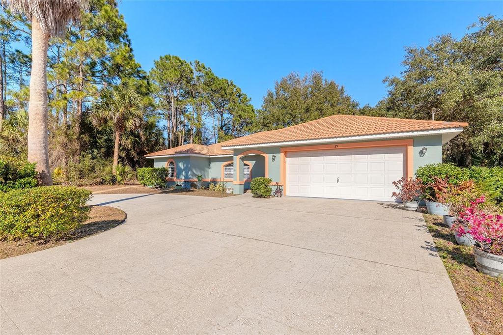 Photo of 39 Princess Ruth Lane, Palm Coast, FL 32164 (MLS # V4947457)