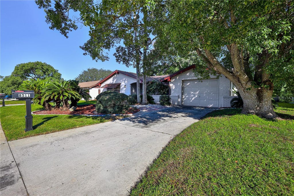 Photo of 8511 Sunflower Lane, Hudson, FL 34667 (MLS # W7890487)
