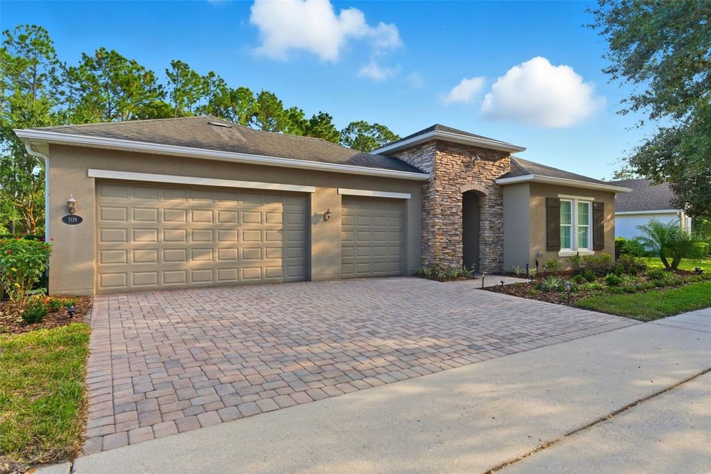 Photo of 1128 Heron Point Way, Deland, FL 32724 (MLS # V4945256)