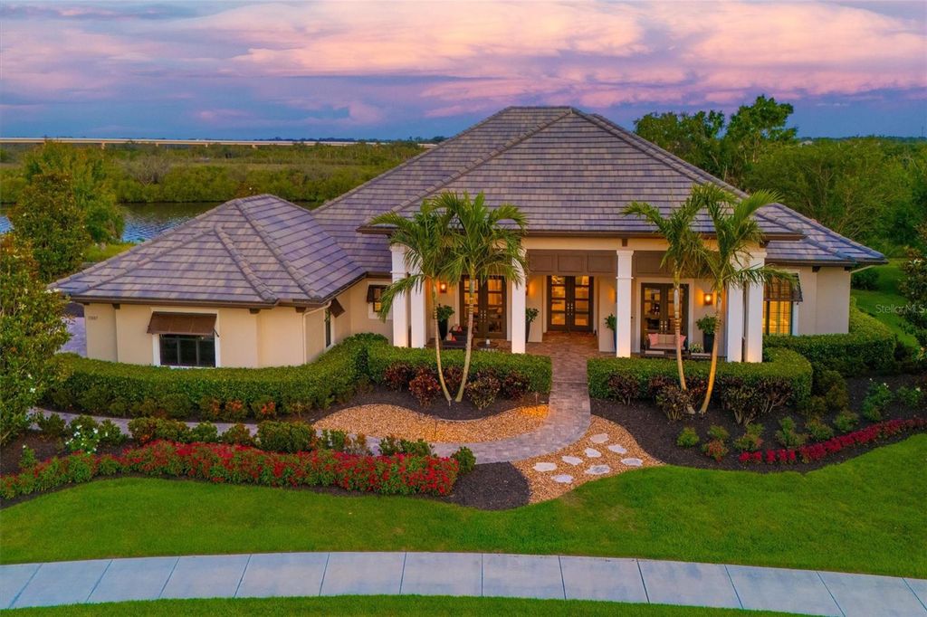 Photo of 11807 Rive Isle Run, Parrish, FL 34219 (MLS # A4652825)