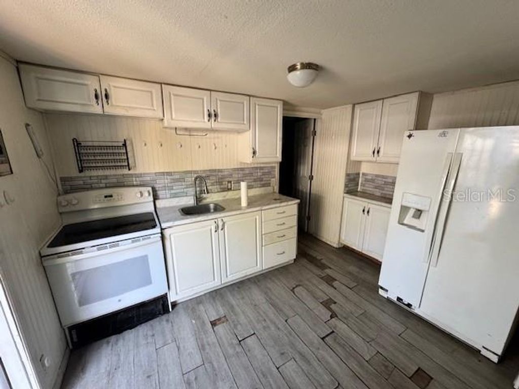 Photo of 4233 Manton Lane, Holiday, FL 34691 (MLS # TB8490381)