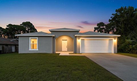 Photo of 243 Eldron Boulevard SE, Palm Bay, FL 32909 (MLS # O6318361) Photo of 243 Eldron Boulevard SE, Palm Bay, FL 32909 (MLS # O6318361)