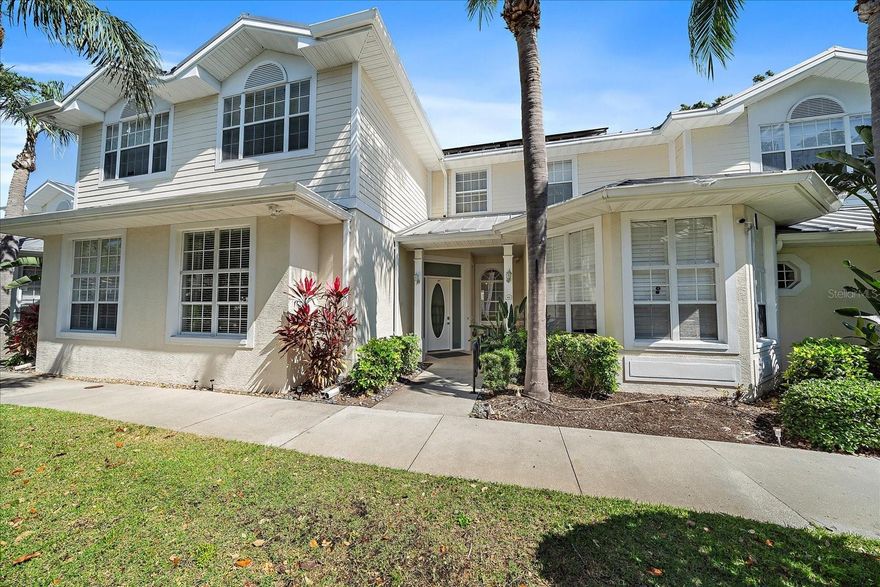 Exquisite 3-bedroom Villa in Bollettieri Resort Villas at IMG Academy. Discover luxury and comfort in this fully furnished, two story villa located in the Bollettieri Resort Villas community, part of the world-renowned IMG Academy. Offering over 3000 square feet of living space, this 3 bedroom and a den, 3.5 bath home features the largest floor plan in the community and a private outdoor terrace, perfect for relaxation or entertaining. Each of the three spacious bedrooms boasts its own ensuite bathroom, crown molding, and ample closet space. The master suite includes a custom walk-in closet, a spa-like bathroom with double sinks, a Jacuzzi tub, and a walk-in shower. Thoughtfully designed, this villa features elegant flooring throughout, no carpet in sight. The kitchen is a chef's dream with stainless steel appliances, extensive granite countertops, a pantry, and a long breakfast bar. An adjacent dining area flows seamlessly into the family room, which is equipped with surround sound audio, crown molding, and tall sliders that open to one of the community's largest tiled patios. Conveniently located on the ground floor are a home office, a laundry room with built in cabinetry and a sink, and a half-bath. This villa also comes with a covered carport and two designated parking spaces. Residents enjoy exclusive access to community amenities, including a heated pool, hot tub, and clubhouse.