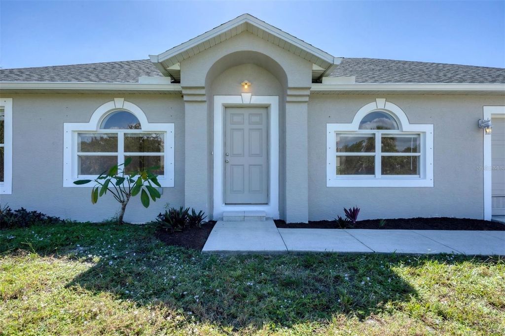 Photo of 14119 Chambersburg Avenue, Port Charlotte, FL 33981 (MLS # D6144339)