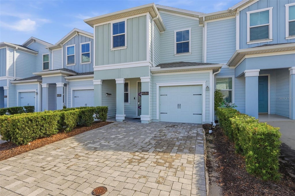 Photo of 4686 Tribute Trail, Kissimmee, FL 34746 (MLS # O6449387)