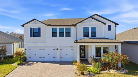 Photo of 21251 Snowy Orchid Terrace, Land O Lakes, FL 34637 (MLS # TB8468611)