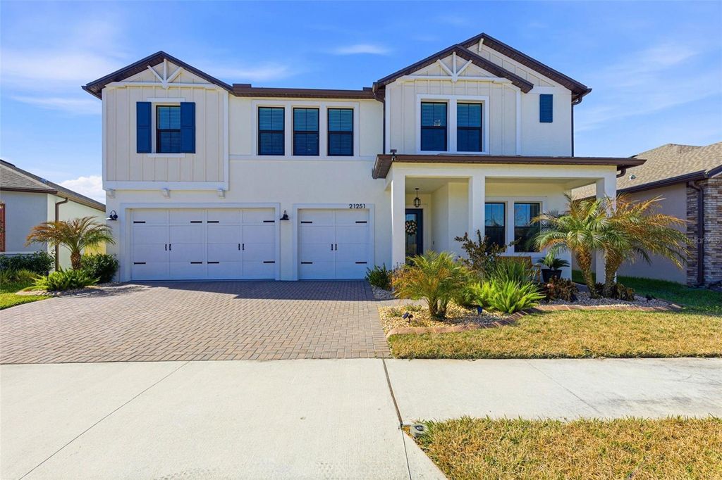 Photo of 21251 Snowy Orchid Terrace, Land O Lakes, FL 34637 (MLS # TB8468611)