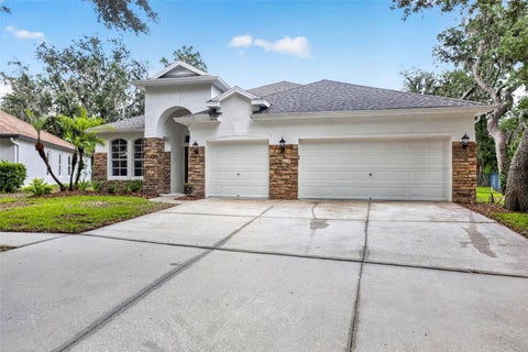 Photo of 6135 Whimbrelwood Drive, Lithia, FL 33547 (MLS # TB8528075)
