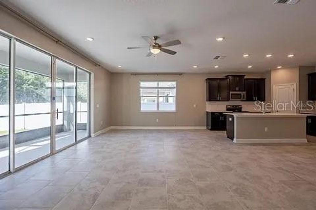 Photo of 4444 Desert Rose Avenue, Kissimmee, FL 34746 (MLS # O6425553)