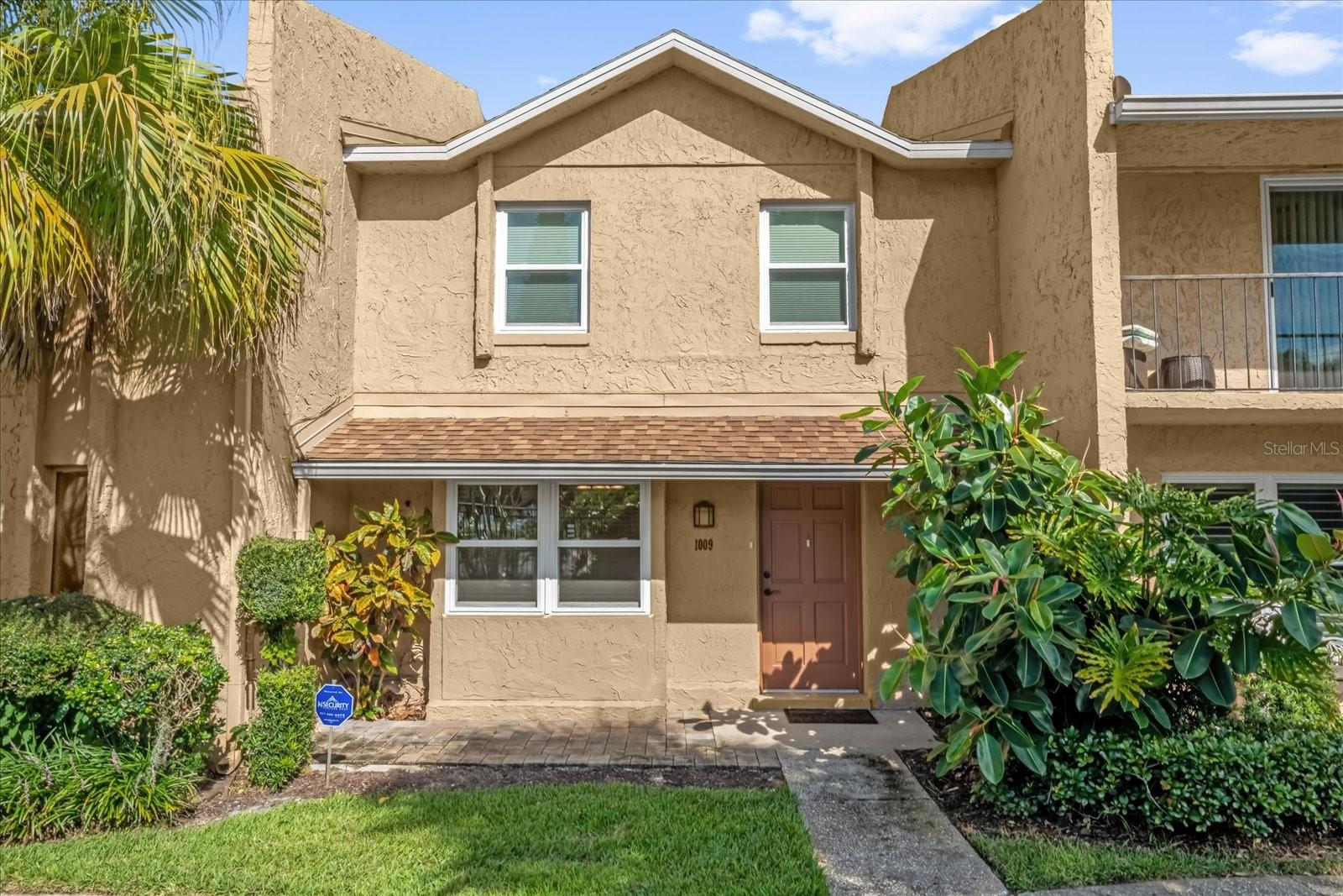 Beautifully updated townhome located in the desirable Park Lake Townhomes subdivision. This charming two-story unit offers 2 bedrooms, 1 full bath, and 1 half bath. The home has been completely renovated with modern and stylish finishes. The kitchen features sleek modern cabinets, granite countertops, and stainless steel appliances. Laminate wood and tile flooring run throughout the home, providing both beauty and durability. The open living and dining areas are perfect for entertaining guests. Upstairs, you'll find two comfortable bedrooms and a fully updated bathroom. A spacious, fenced-in patio offers a private outdoor retreat. The property also includes a 1-car garage for added convenience. Community amenities include a sparkling pool for residents to enjoy.