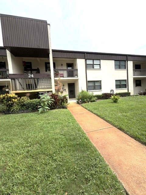 Photo of 2400 Winding Creek Boulevard #24-102, Clearwater, FL 33761 (MLS # TB8534466)